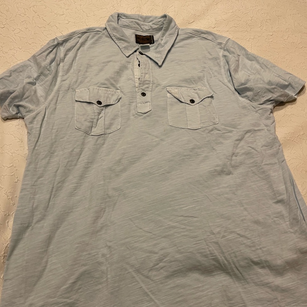Light blue 2 pocket Lucky Brand polo